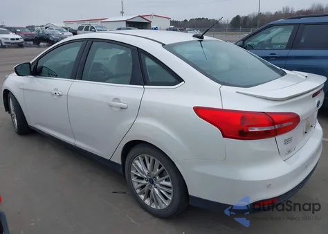 2015 Ford Focus Titanium из США, поврежденный, VIN 1FADP3J26FL338742